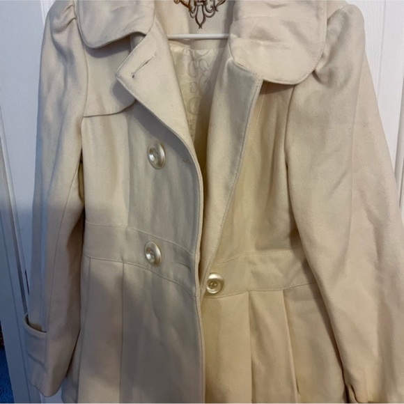 This is a Guess jacket perfect for any occasion and it’s a large jacket. - Picture 2 of 7